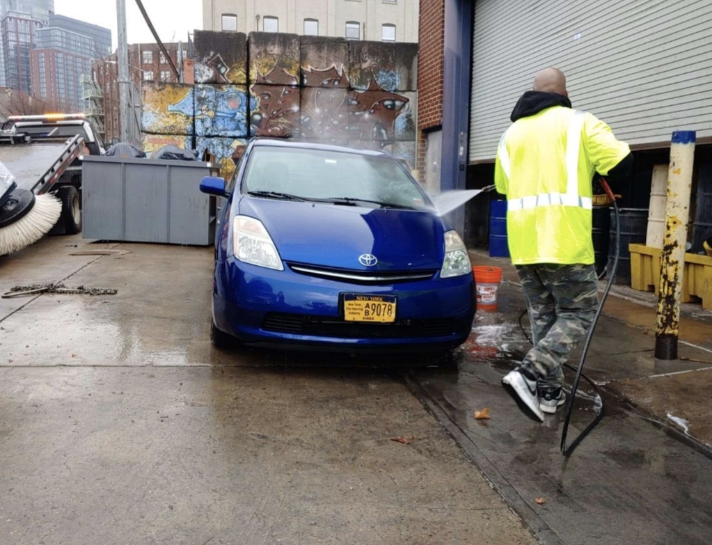 Pressure washing a vehicle exterior